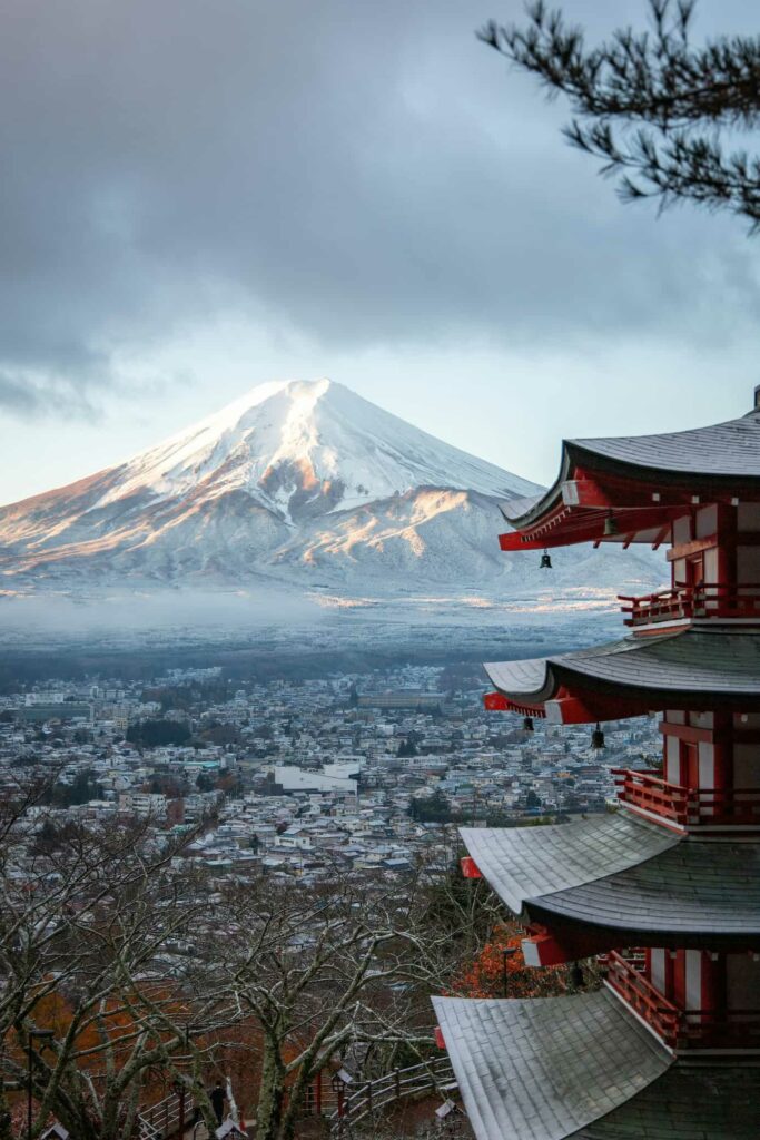 Panoramic view of Mount Fuji and the red Chureito Pagoda in Japan.